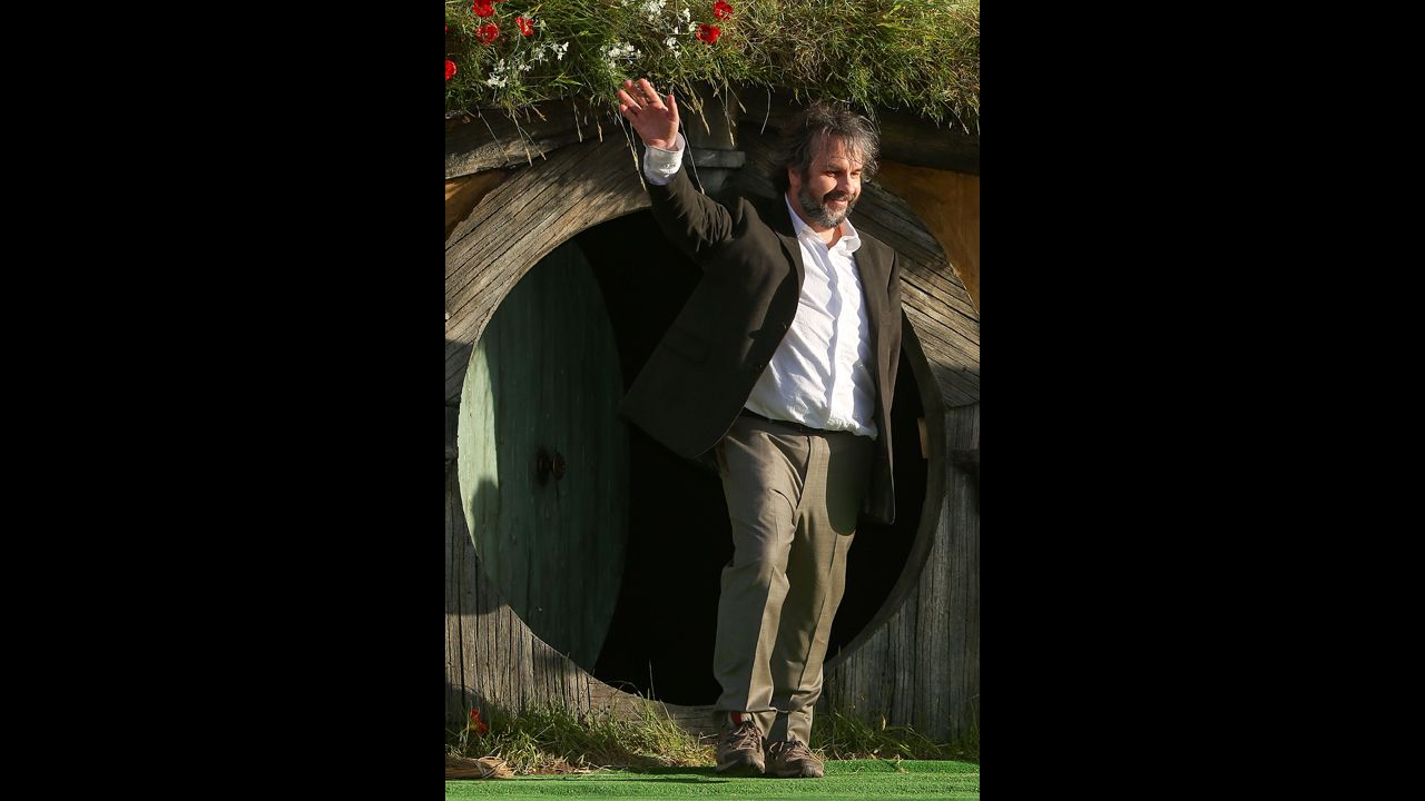 Director Sir Peter Jackson emerges from from a Hobbit house before delivering a speech at the <a href="http://ireport.cnn.com/docs/DOC-887116">world premiere</a> of "The Hobbit: An Unexpected Journey" on Wednesday, November 28,  2012, in Wellington, New Zealand.
