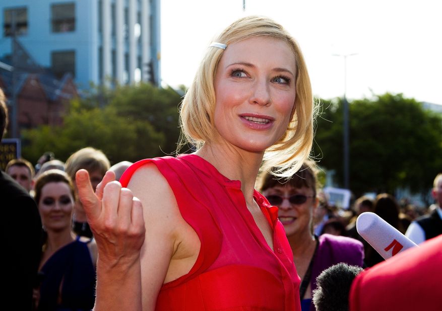 Actress Cate Blanchett speaks to reporters upon her arrival.