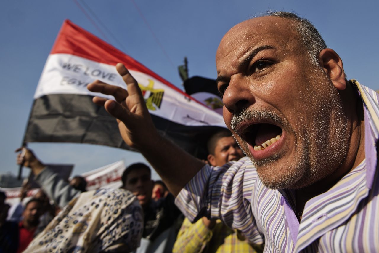 A man shouts as protesters gather in Tahrir Square on November 30.