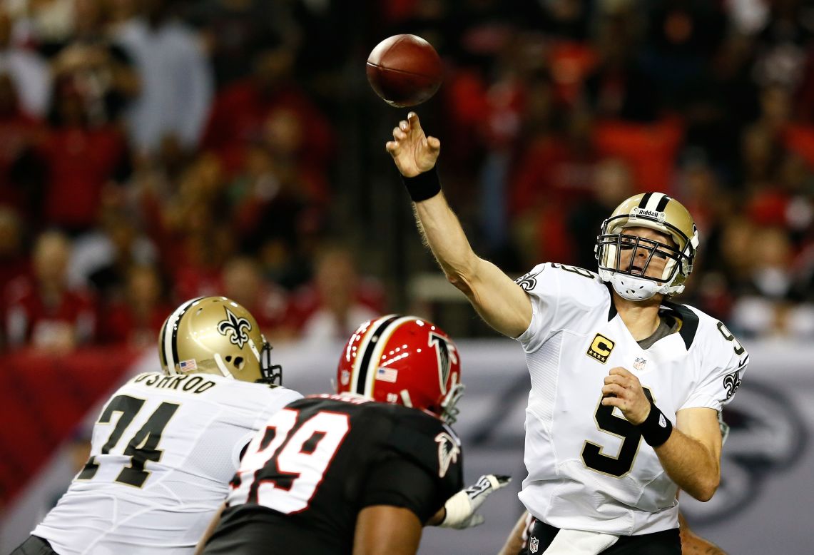Quarterback Drew Brees of the New Orleans Saints passes against the Atlanta Falcons at the Georgia Dome on Thursday.