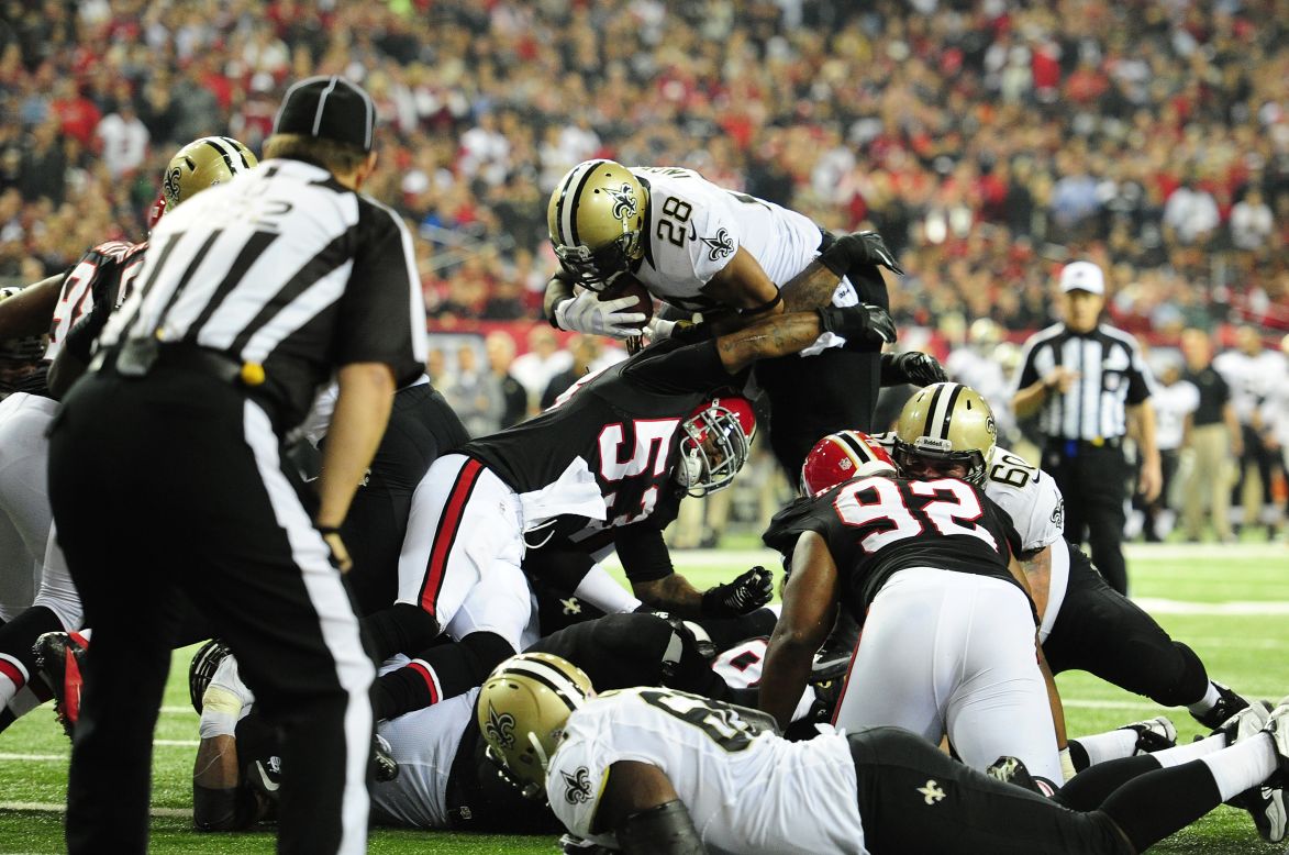 Mark Ingram of the New Orleans Saints scores a second quarter touchdown against the Atlanta Falcons on Thursday.