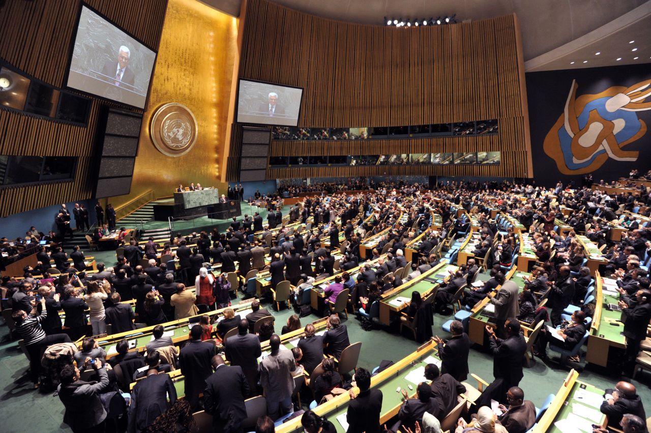 Palestinian Authority President Mahmoud Abbas is greeted by a standing ovation before speaking to the U.N. General Assembly about a vote on a resolution to upgrade the status of the Palestinian Authority to a nonmember observer state on Thursday, November 29, 2012, at U.N. headquarters in New York City.