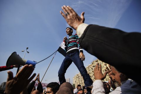 An Egyptian man delivers a speech as protesters gather in Cairo's Tahrir Square on Friday, November 30.