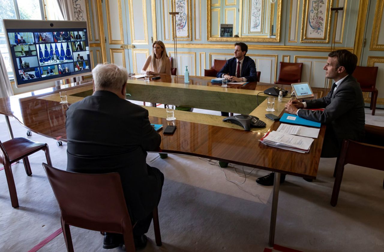 French President Emmanuel Macron attends a video conference call with members of the European Council at the Elysee Palace in Paris, on April 23.