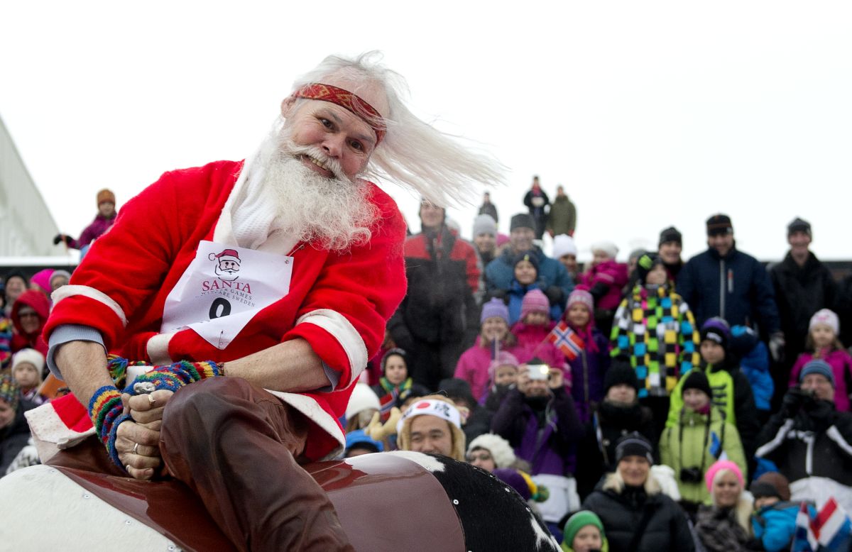 A Santa Claus representing the indigenous Sami people competes in the reindeer ride event during the Santa Claus Winter Games in Gallivare on November 17.