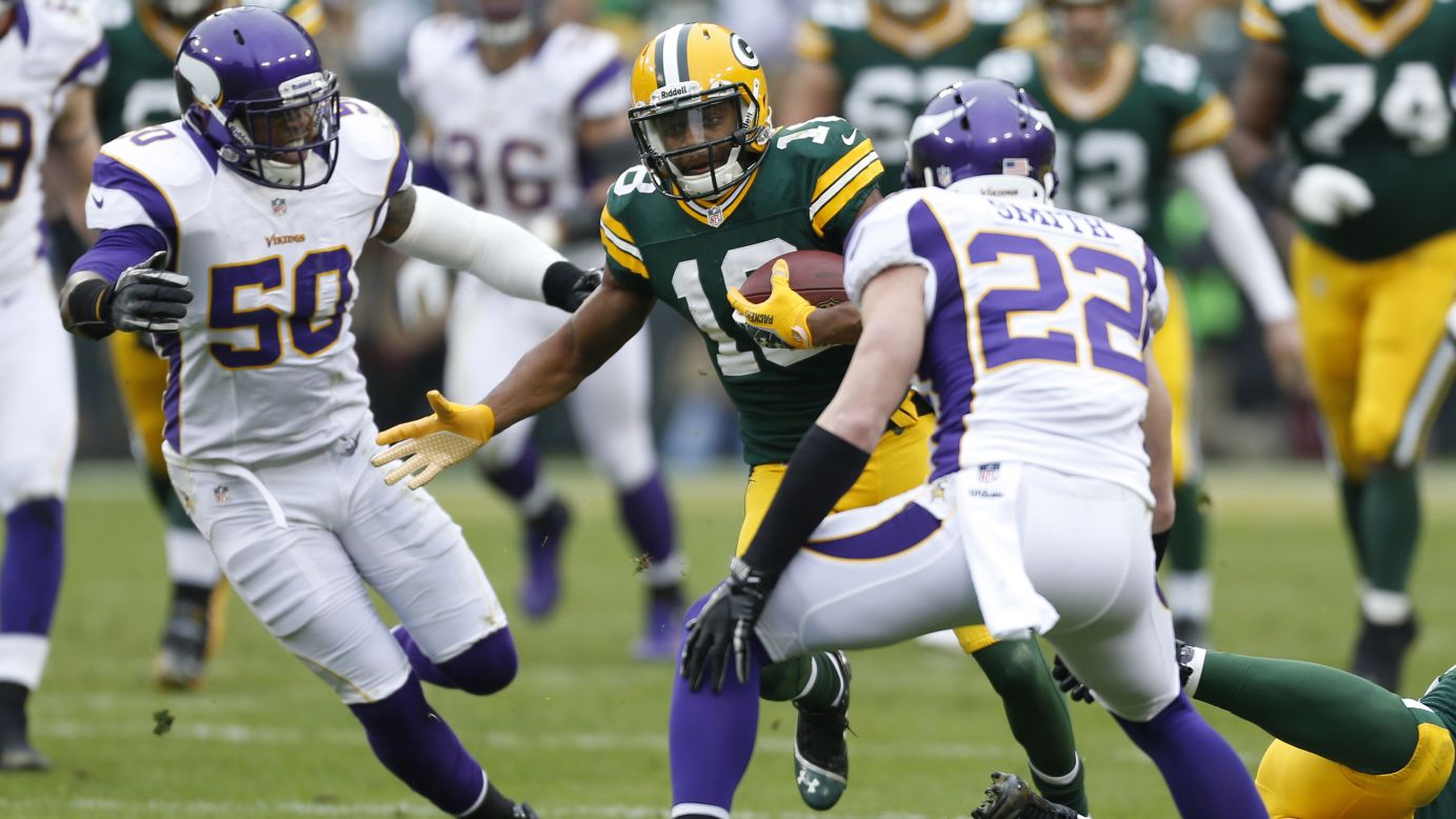 Randall Cobb of the Green Bay Packers runs the ball against the Minnesota Vikings on Sunday.