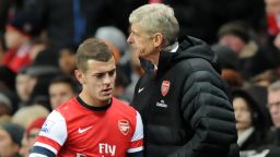 Arsenal manager Arsene Wenger, right, with midfielder Jack Wilshere after the 2-0 home defeat by Swansea City.