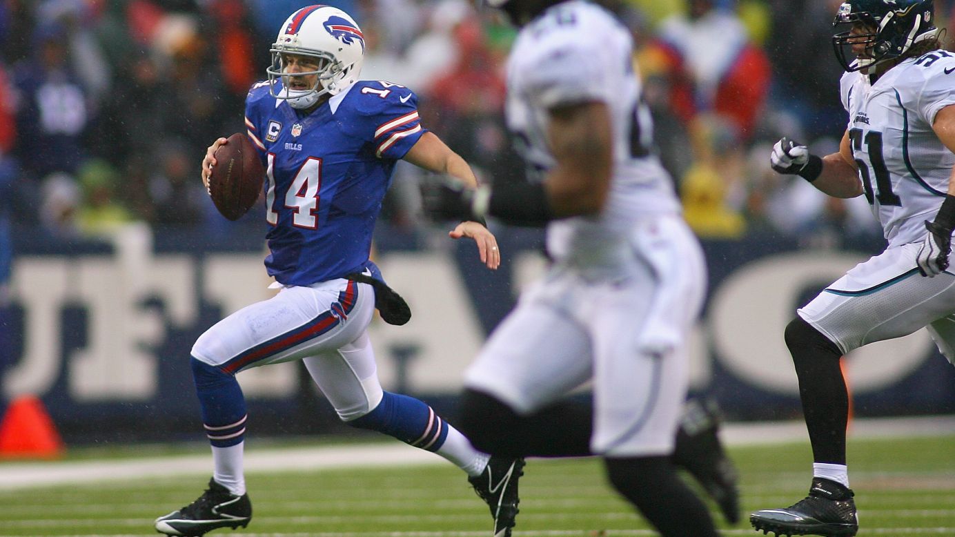 Quarterback Ryan Fitzpatrick of the Buffalo Bills runs for a first down against the Jacksonville Jaguars at Ralph Wilson Stadium on Sunday in Orchard Park, New York.