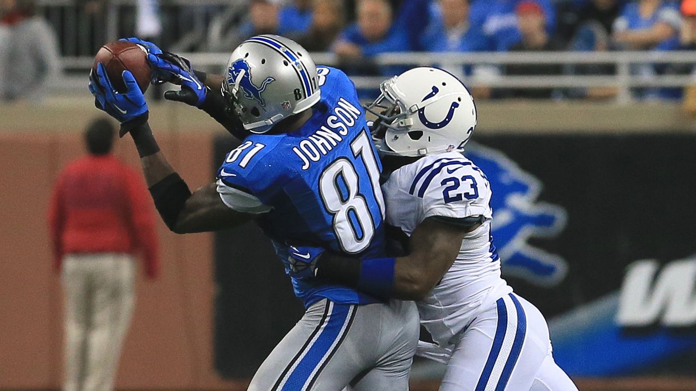 Calvin Johnson of the Detroit Lions catches the ball in front of Vontae Davis of the Indianapolis Colts on Sunday.