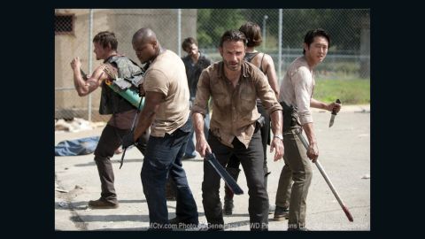 Norman Reedus, from left, IronE Singleton, Andrew Lincoln and Steven Yeun star in AMC's "The Walking Dead."