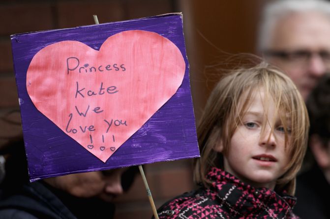 A young child holds up a banner as Catherine visits Alder Hey Children's NHS Foundation Trust on February 14, 2012, in Liverpool, England.