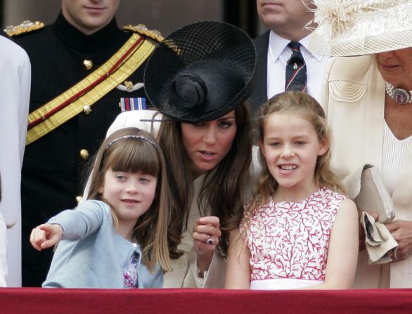 Eloise Taylor, Catherine and Margarita Armstrong-Jones stand on the balcony of Buckingham Palace after the Colour Parade on June 11, 2011, in London. The parade is a celebration of the sovereign's official birthday, although the queen's actual birthday is on April 21. 