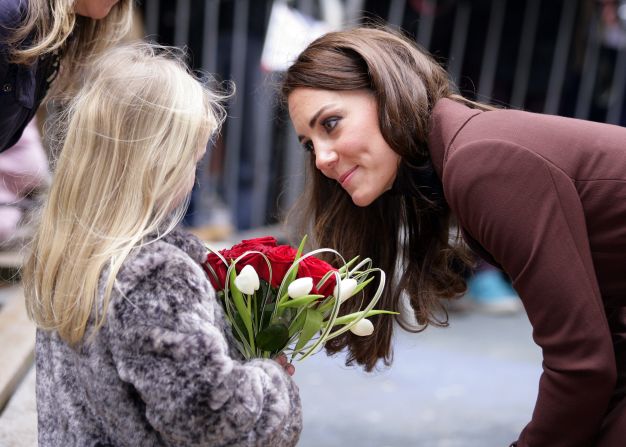 Catherine talks with a young girl as she arrives for a visit to Alder Hey Children's Hospital on February 14, 2012, in Liverpool, England. 
