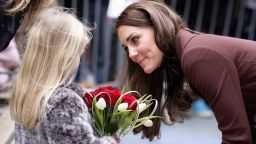 LIVERPOOL, UNITED KINGDOM - FEBRUARY 14: (EMBARGOED FOR PUBLICATION IN UK NEWSPAPERS UNTIL 48 HOURS AFTER CREATE DATE AND TIME) Catherine, Duchess of Cambridge talks with a young girl as she arrives for a visit to Alder Hey Children's Hospital on February 14, 2012 in Liverpool, England. (Photo by Indigo/Getty Images)