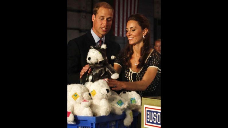 Prince William and Catherine help pack care packages for military children at the Mission Serve: Hiring Our Heroes event on July 10, 2011, in Culver City, California. 