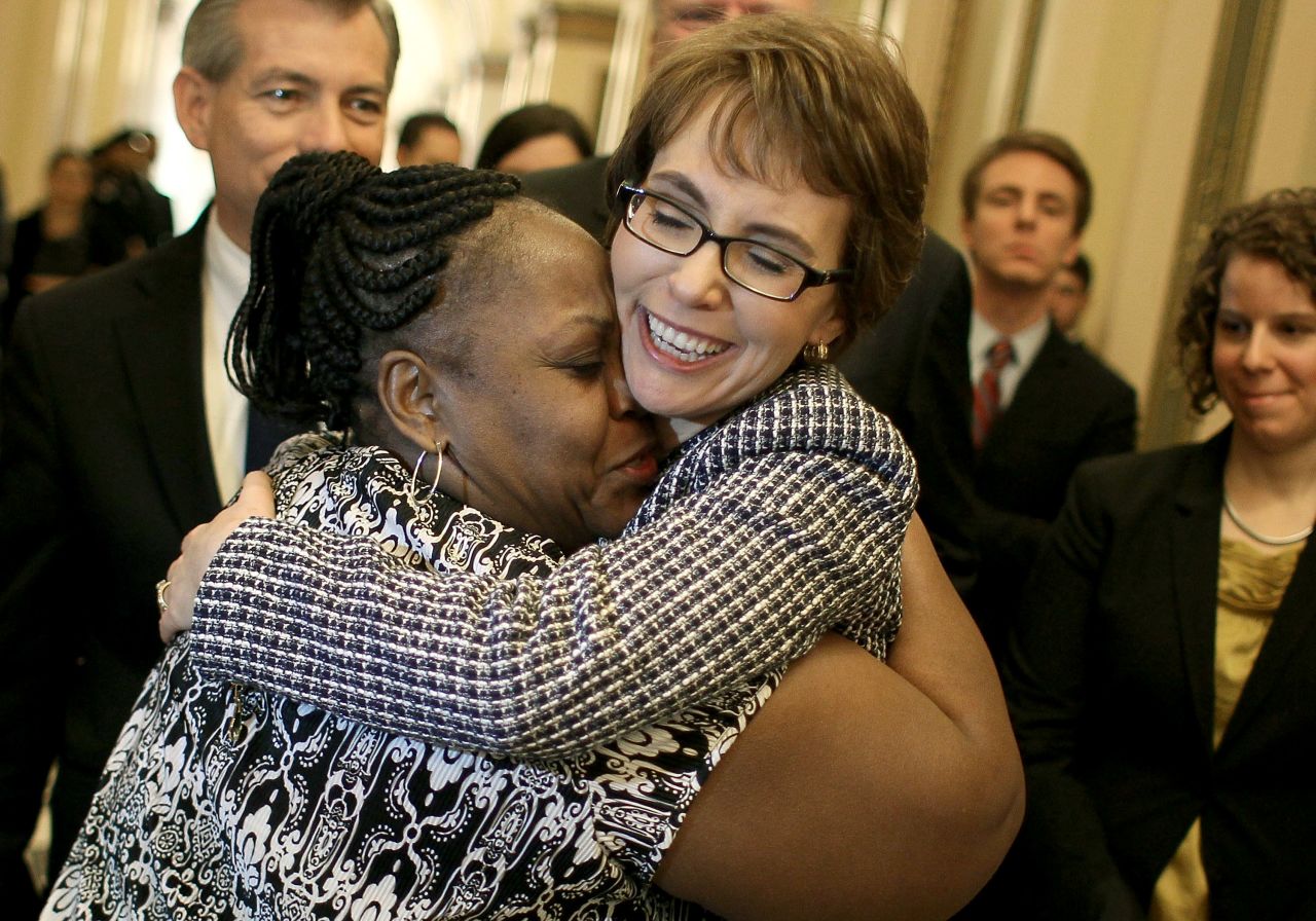 <strong>January 25: </strong>Former U.S. Rep. Gabrielle Giffords hugs House Cloak Room attendant Ella Terry after resigning from Congress. Giffords stepped down to focus on her recovery from a gunshot wound to the head she received last year in Tucson, Arizona. On August 7, Jared Lee Loughner plead guilty to 19 charges in the 2011 shooting that killed six people and wounded Giffords, among others.