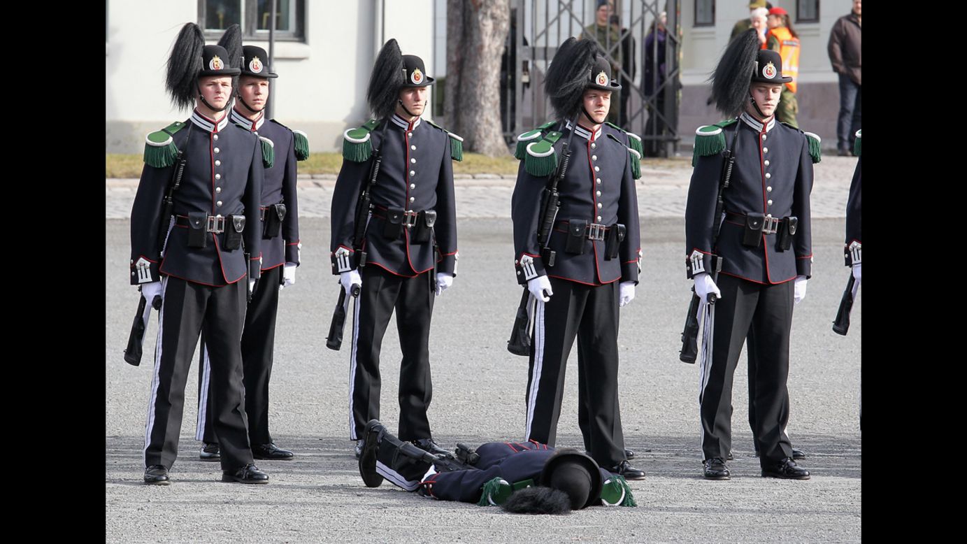 <strong>March 20: </strong>A soldier faints as Camilla, Duchess of Cornwall, and Prince Charles, Prince of Wales, arrive for a wreath-laying ceremony at the National Monument at Akershus Fortress in Olso, Norway. The royals were on a Diamond Jubilee tour of Scandinavia.