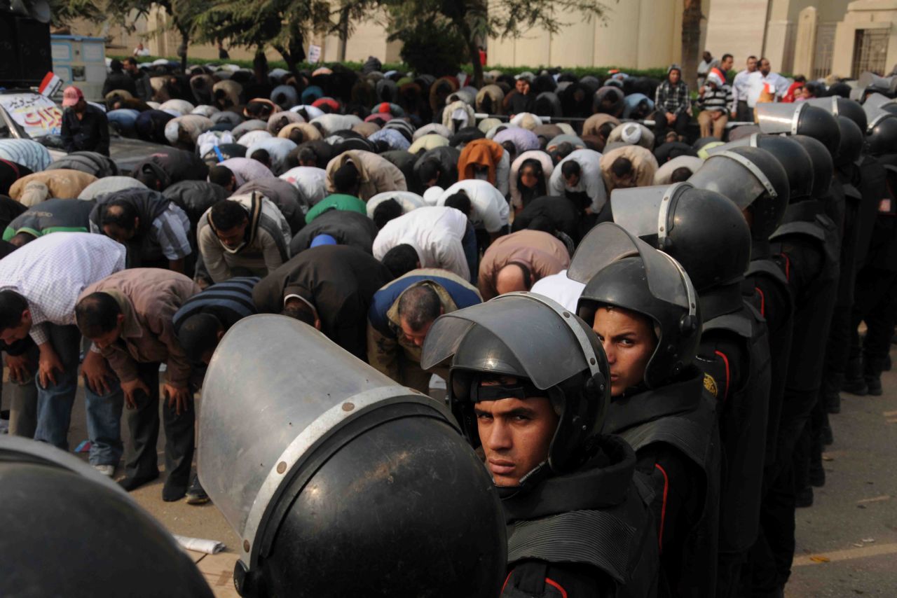 Supporters of Morsy pray outside the Supreme Constitutional Court on December 2.