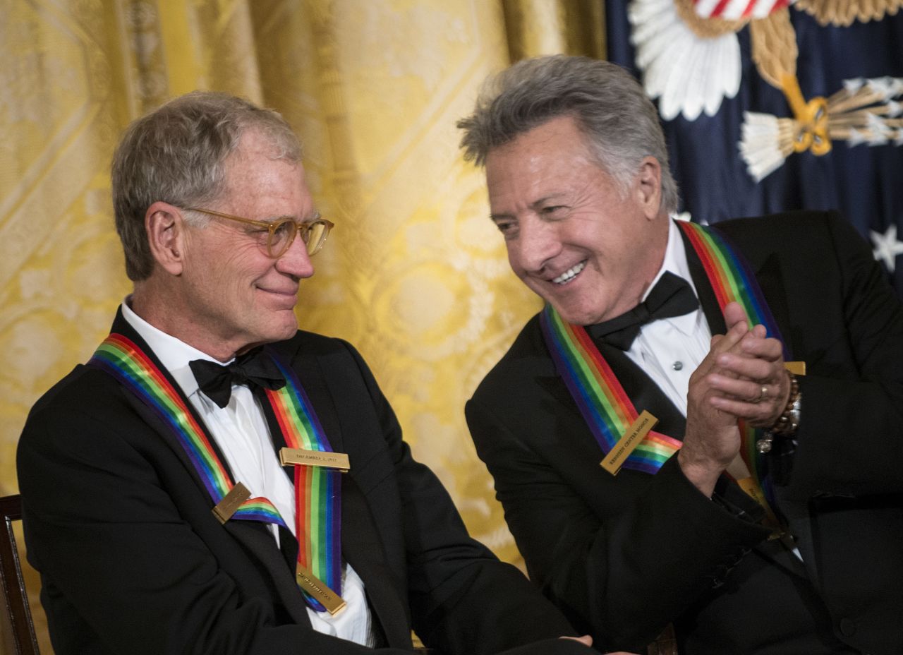 David Letterman, left, chats with Dustin Hoffman during an event Sunday in the White House East Room before the 35th Kennedy Center Honors.