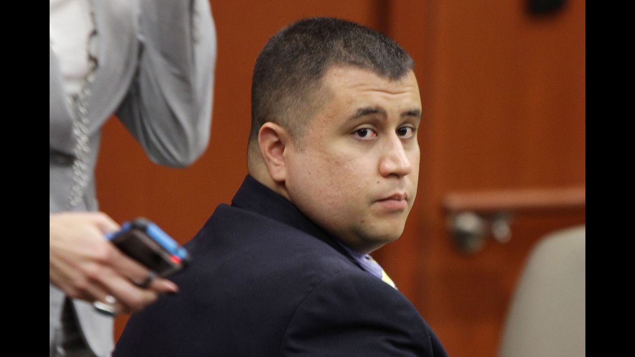 <strong>October 19: </strong>George Zimmerman watches during his hearing at the Seminole County Courthouse in Sanford, Florida. He will go on trial June 10, 2013, for the killing of 17-year-old Trayvon Martin. The neighborhood watch volunteer is charged with second-degree murder in the February 26 shooting.