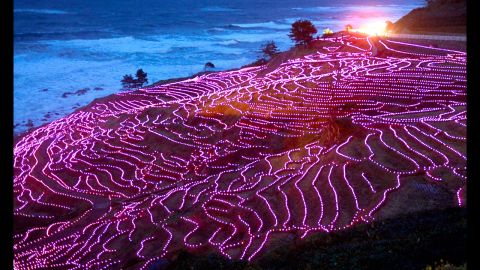 <strong>November 10: </strong>Terraced rice paddies of Shiroyone Senmaida glow with 20,000 solar-powered pink LED lights in Wajima, Japan, to be recorded in Guinness World Records. The rice paddies were registered as Globally Important Agricultural Heritage Systems last year.
