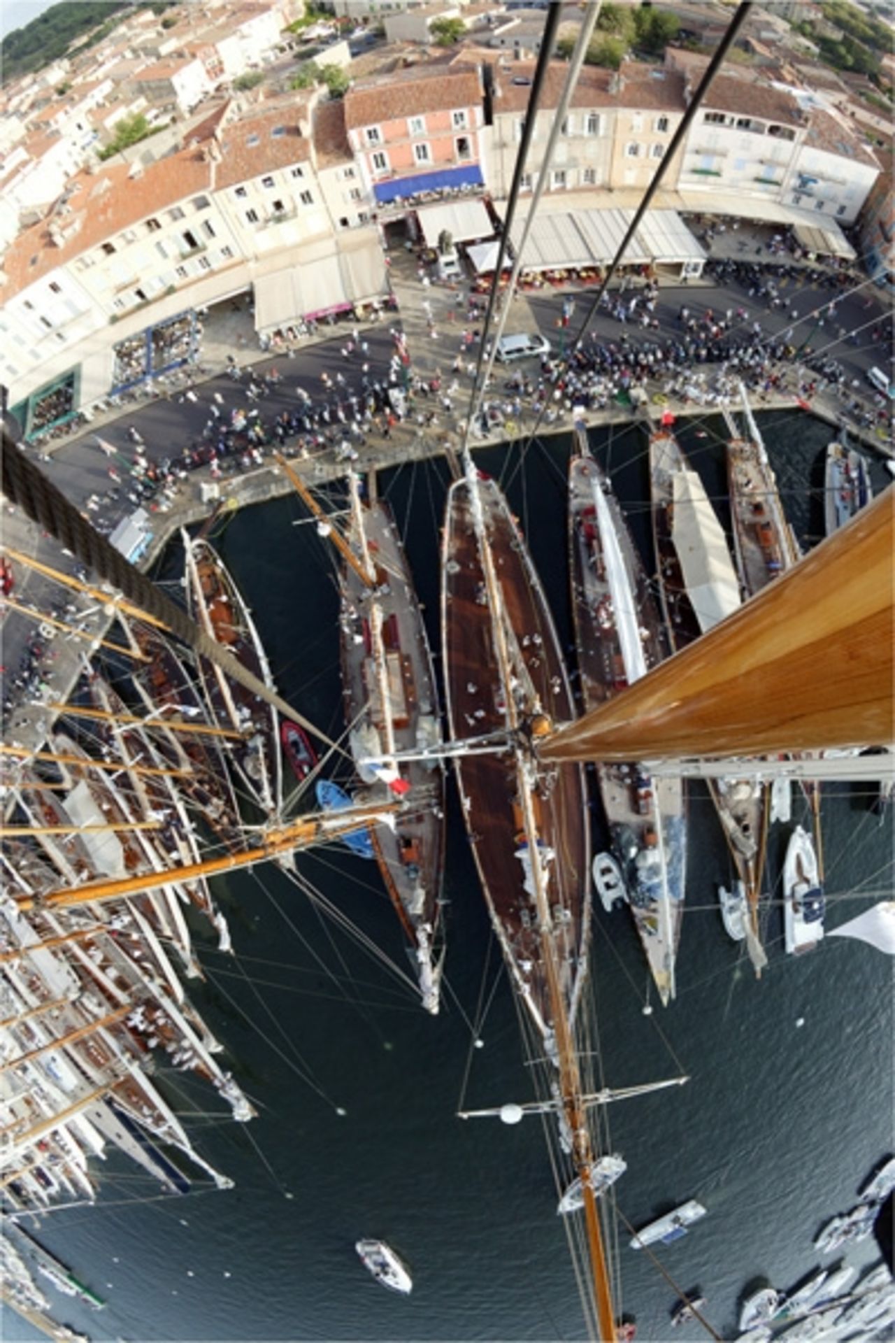 Kos photographed Saint Tropez harbor from the top of 52 meter schooner Eleonora. "Whilst guest and crew were chatting on deck and strollers gathered on the promenade, I donned a harness and was hoisted 45 meters aloft," she said.
