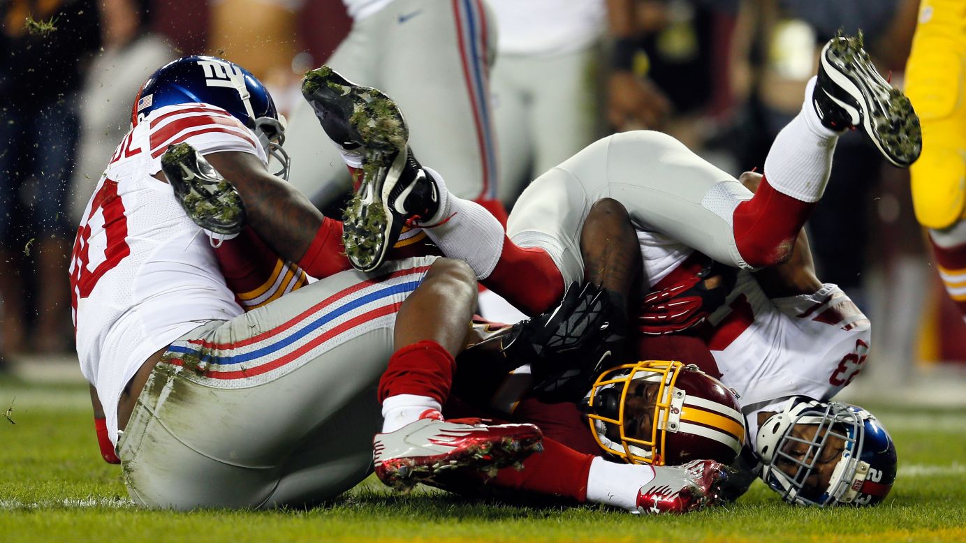 Josh Morgan of the Redskins scores a touchdown after recovering a fumble by teammate Robert Griffin III on Monday.