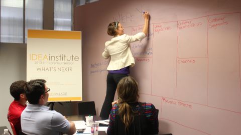 Entrepreneurs work on business plans at IDEAinstitute, a weekly forum that helps sustain New Orleans' entrepreneurs. 