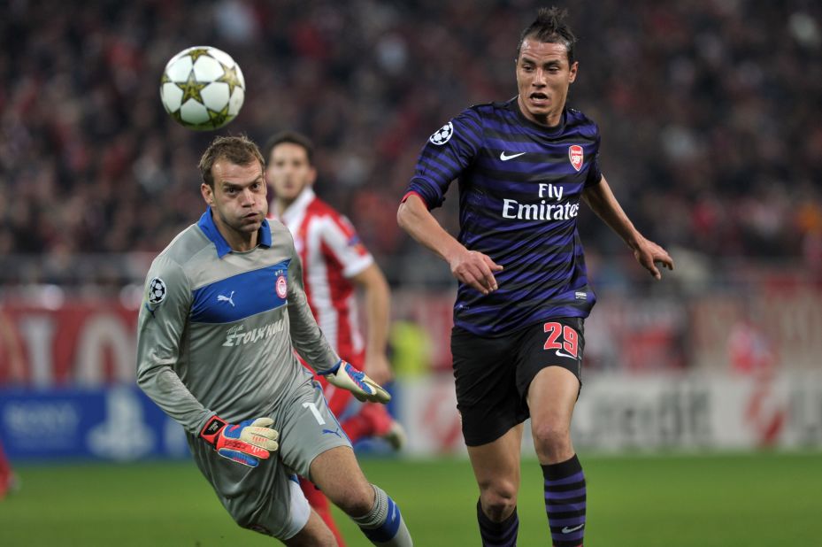 Arsenal's Marouane Chamakh endured a disappointing night as the Gunners were beaten 2-1 by Olympiakos in Greece. Tomas Rosicky's effort had given Arsenal the lead but strikes from Giannis Maniatis and Kostas Mitroglou gave the Greek side victory.