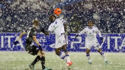 Dynamo Kiev's Ideye Brown fights for the ball with Dinamo Zagreb's Domagoj Vida in a game which was halted after 11 minutes following a snow storm in Croatia. The teams returned to the field after a 17 minute delay and played out a 1-1 draw