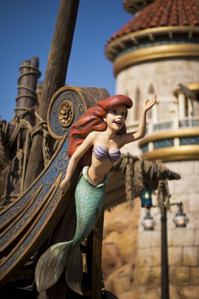Inside, guests board giant clamshells as animation and animatronics retell Ariel's story.