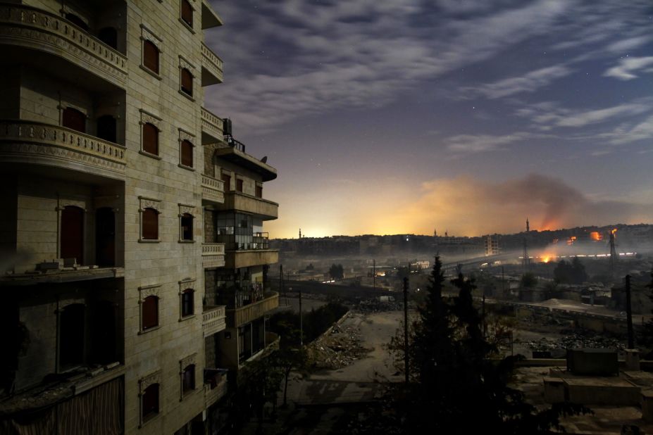 Smoke rises in the Hanano and Bustan al-Basha districts in Aleppo on December 1, 2012 as fighting continues through the night.