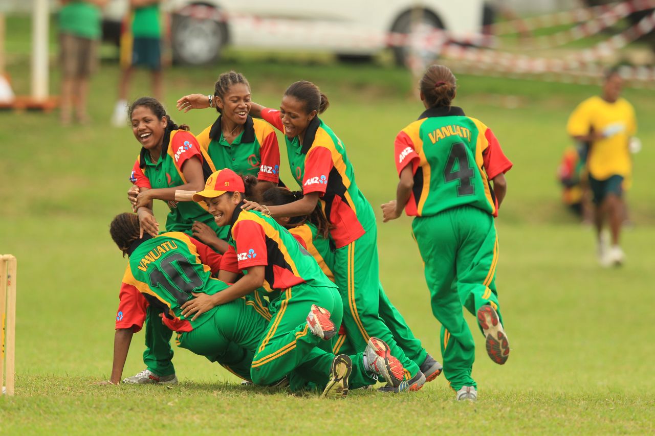 The Vanuatu women's national cricket team celebrates during a match against Japan at Independence Park during the ICC East Asia Pacific Women's Championship on May 17 in Port Vila, Vanuatu. 