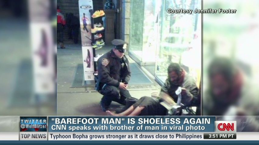 tsr pkg snow NYC homeless man shoes _00001218