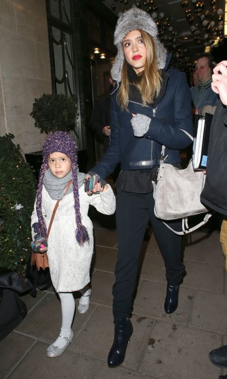 Jessica Alba and her daughter head out in London.