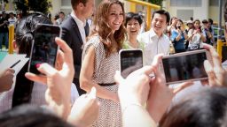 Catherine, Duchess of Cambridge is photographed by members of public on September 12, 2012 in Singapore.