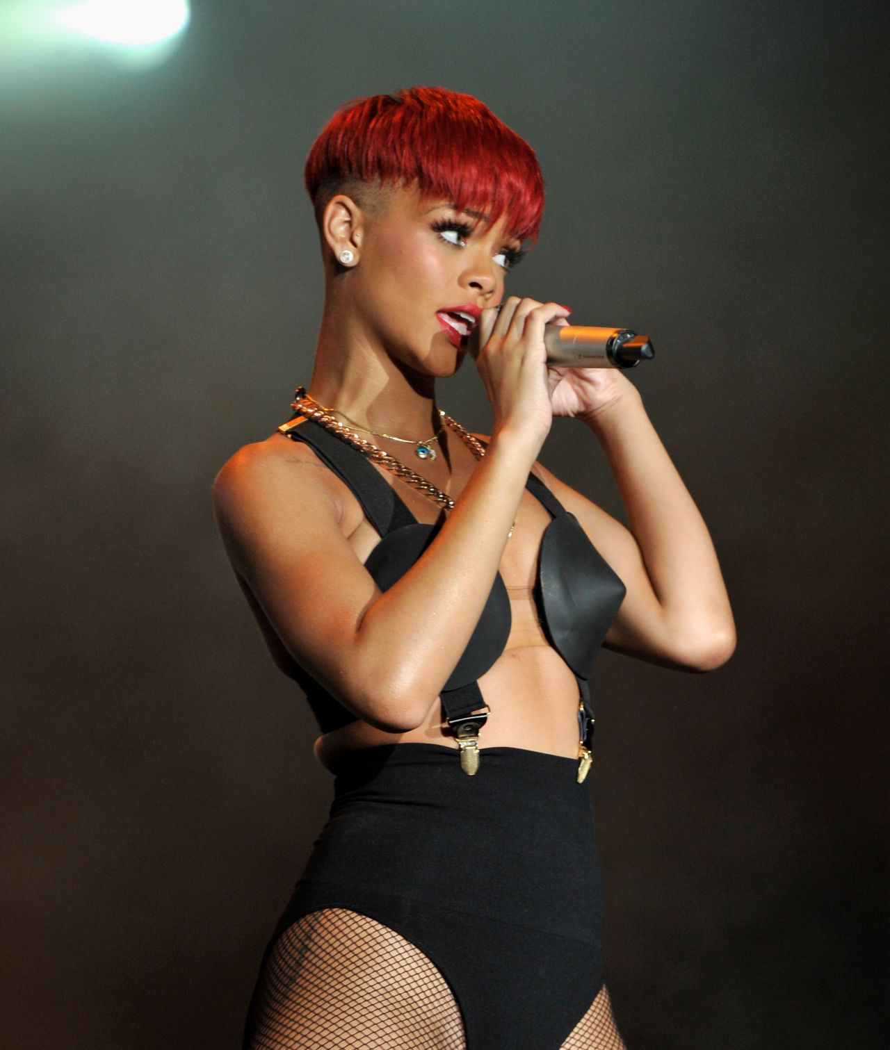Sporting new red locks, the singer performs during a June 2010 festival in Arganda del Rey, Spain.
