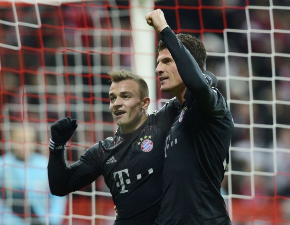 Mario Gomez and Xherdan Shaqiri were both on target as last year's finalist Bayern Munich secured top spot in Group F with a 4-1 win over 10-man BATE Borisov. Thomas Muller and David Alaba were also on target, while Denis Polyakov was sent off for BATE.