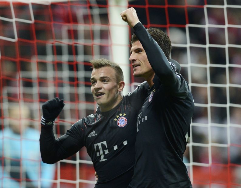 Mario Gomez and Xherdan Shaqiri were both on target as last year's finalist Bayern Munich secured top spot in Group F with a 4-1 win over 10-man BATE Borisov. Thomas Muller and David Alaba were also on target, while Denis Polyakov was sent off for BATE.