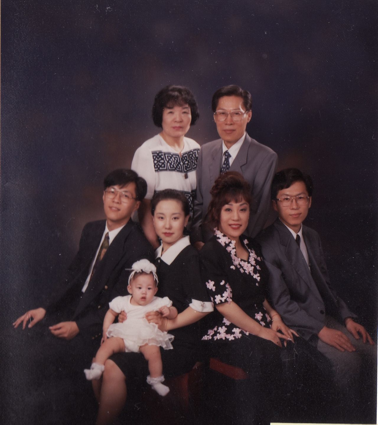 Sumi Jo (front row, second from right) with her parents and other family members. She was in Paris performing when her father died and missed his funeral because her mother persuaded her to stay and "sing for your public." 