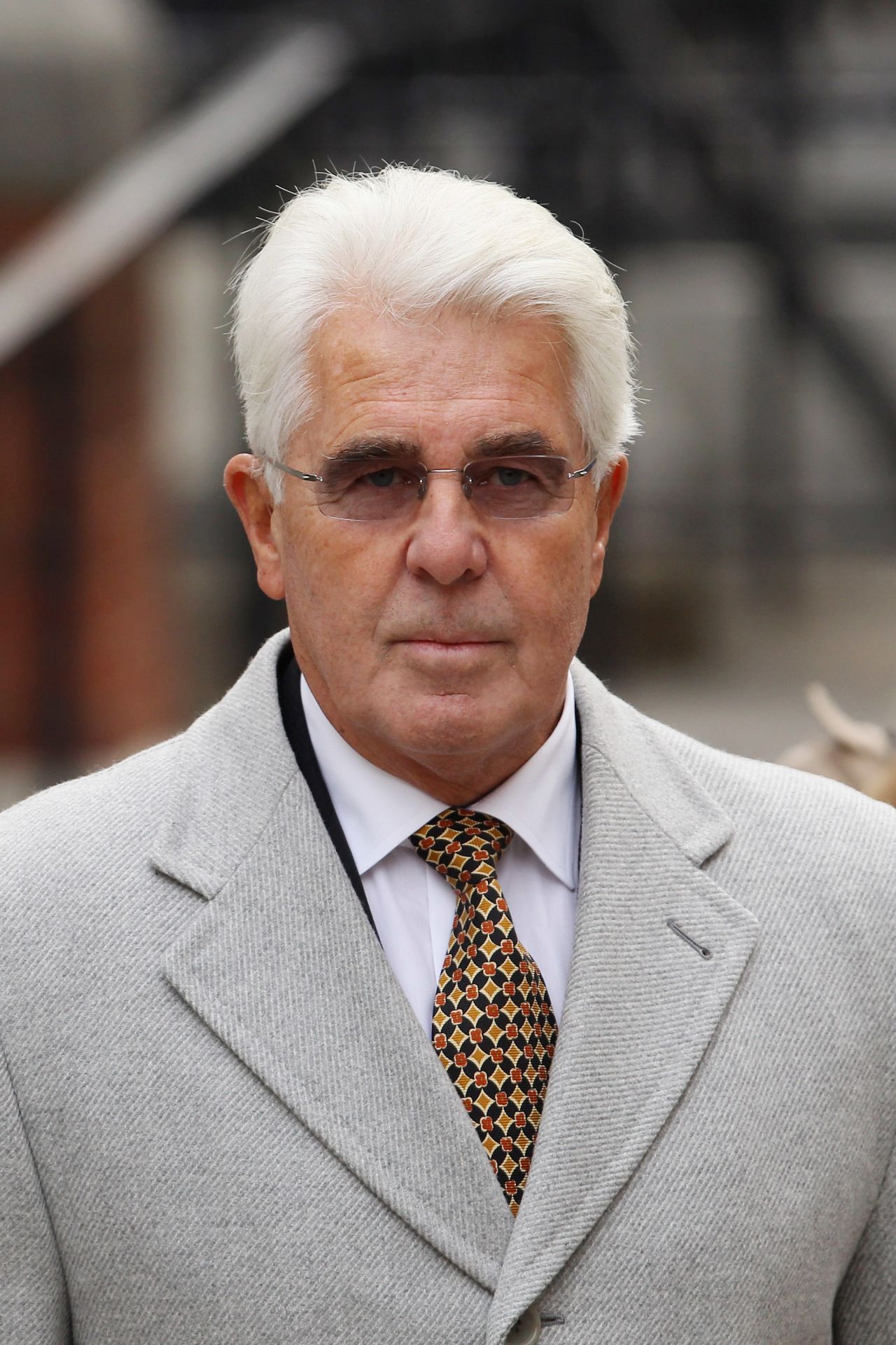 Celebrity public relations agent Max Clifford dropped his lawsuit against the News of the World in March 2010 for a payment of more than 1 million pounds ($1.6 million).