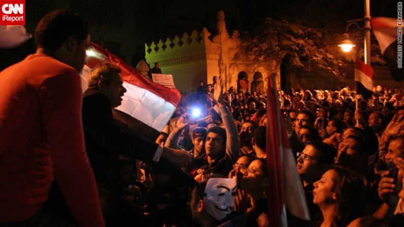 By December 4, protests had gotten larger and anti-government demonstrators <a href="http://ireport.cnn.com/docs/DOC-891041">marched on the presidential palace</a> in Cairo, as seen in this image by iReporter Maged Eskander. Crowds shouted "liar" in reference to Morsy and chanted anti-Muslim Brotherhood slogans.  