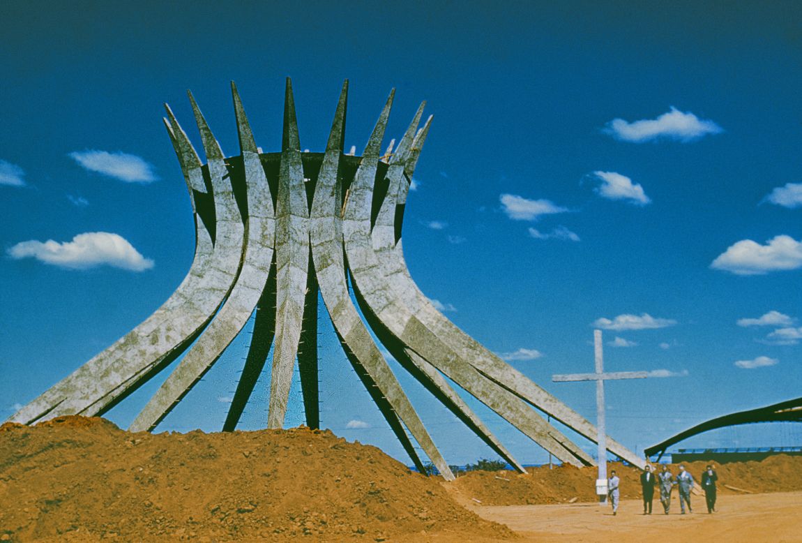 The cornerstone of Niemeyer's <a href="http://catedral.org.br/historia" target="_blank" target="_blank">Cathedral of Brasilia</a> was laid in 1958. This hyperboloid structure consists of 16 concrete pillars, each weighing 90 tons, and covers a circular area that is 70 feet in diameter. This photo was taken in the 1960s, but the building was finally inaugurated in 1970.