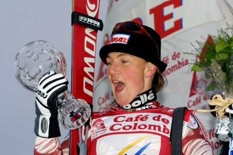 France's Regine Cavagnoud lifts the trophy for overall winner of the Women's Super G in the 2001 World Cup, but a few months later she was tragically killed in a training accident. 