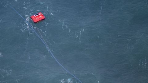 A red buoy marks the spot where the cargo ship "Baltic Ace" sank in the North Sea after colliding with a car carrier, December 5.