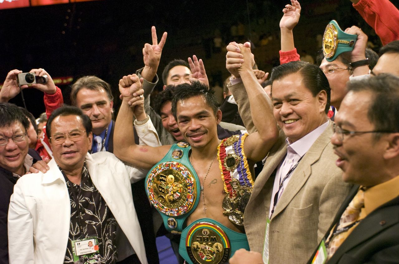 Pacquiao was given the fight and subsequently took Marquez's super featherweight title, with a knockdown in the third round proving the difference after all other rounds were scored equal.