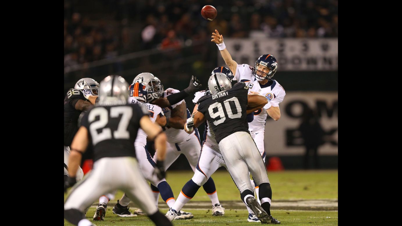 Peyton Manning of the Denver Broncos passes the ball against the Oakland Raiders on Thursday.