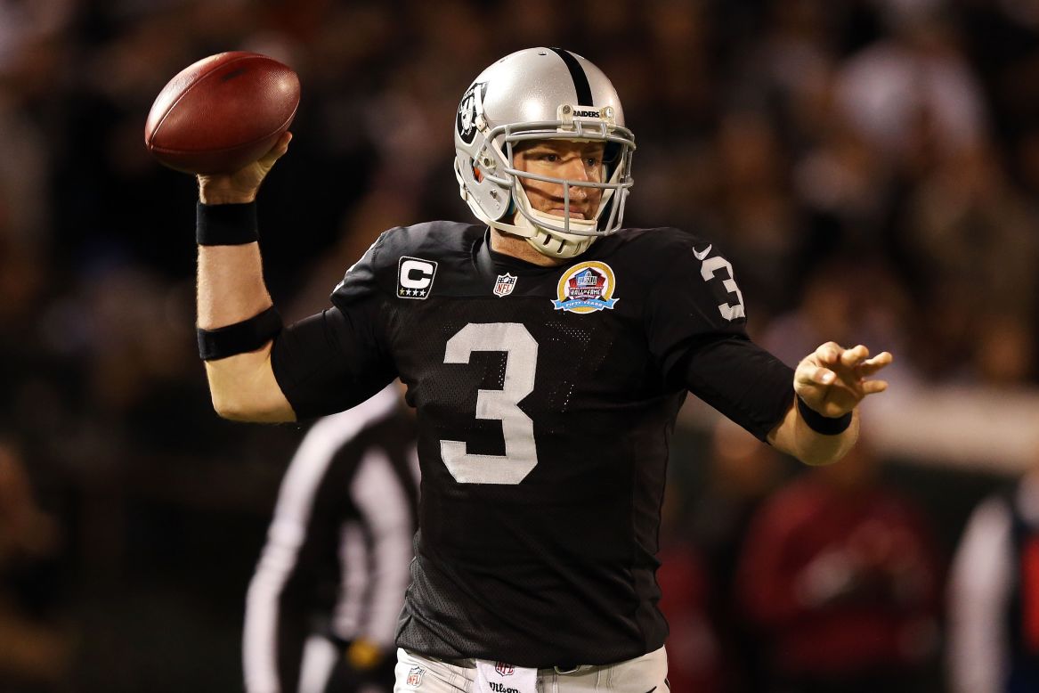 Carson Palmer of the Oakland Raiders drops back to pass against the Denver Broncos on Thursday.
