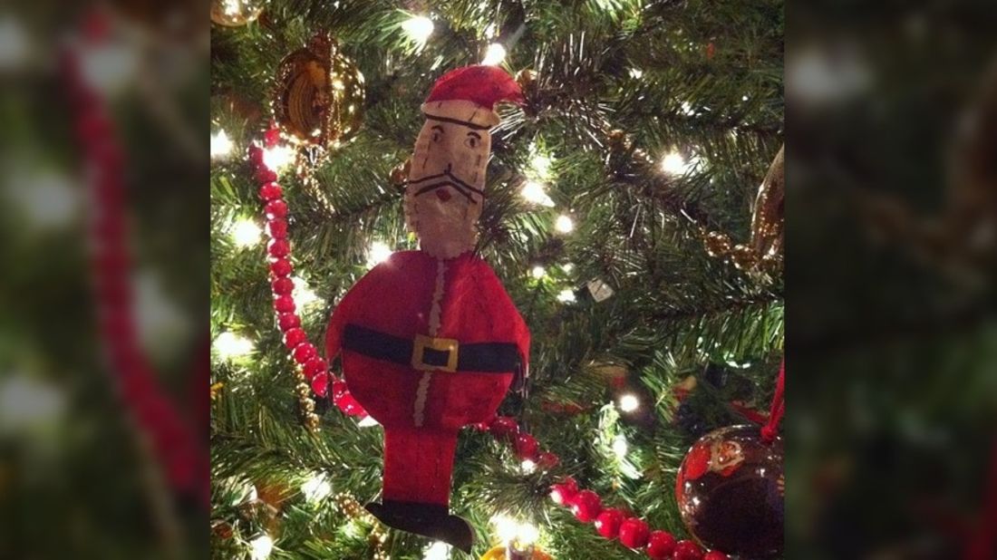 "Every Christmas Eve as a kid, I'd go to work with my dad. When I was about 10, I raided his highlighters and permanent markers and started making ornaments out of office supplies. This jolly Santa was my best creation. It's been on the tree ever since." -- Christina Zdanowicz (@stinaz27), CNN iReport producer