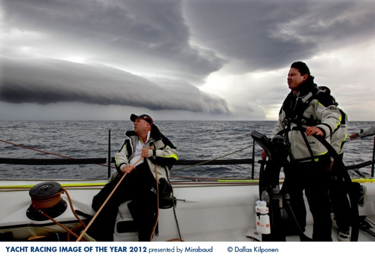Sailors brace for a storm during the Rolex Sydney to Hobart Yacht Race in this photo by Dallas Kilponen.
